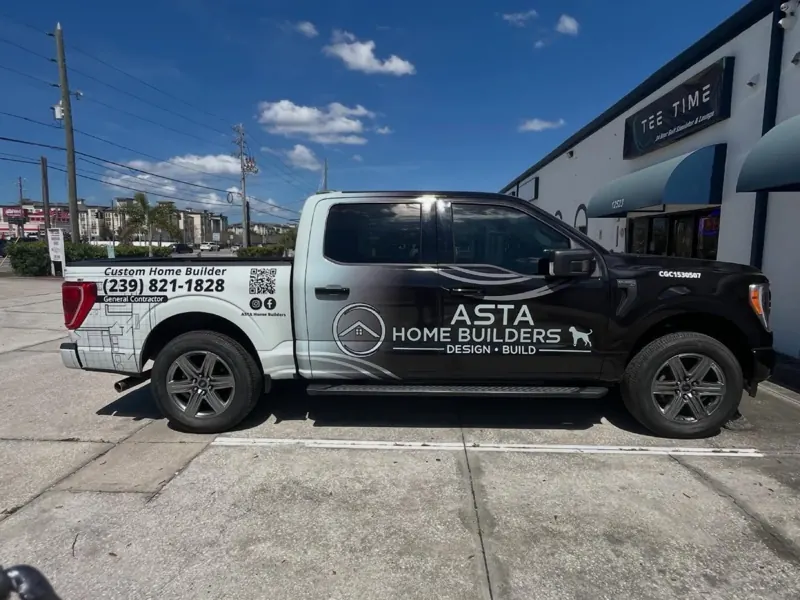 ASTA Home Builders black and white branded pickup truck