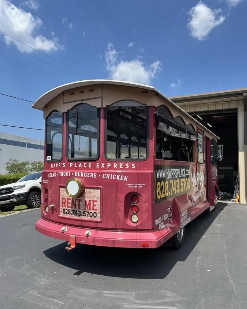 Happ's Place Express burgundy wrapped trolley
